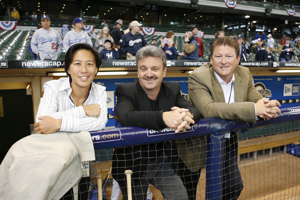 shown with Ned Colletti and Logan White, would like to see more women and minorities enter baseball’s ranks.