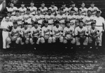 Joe Tracy is seated in the back row, second from left.
