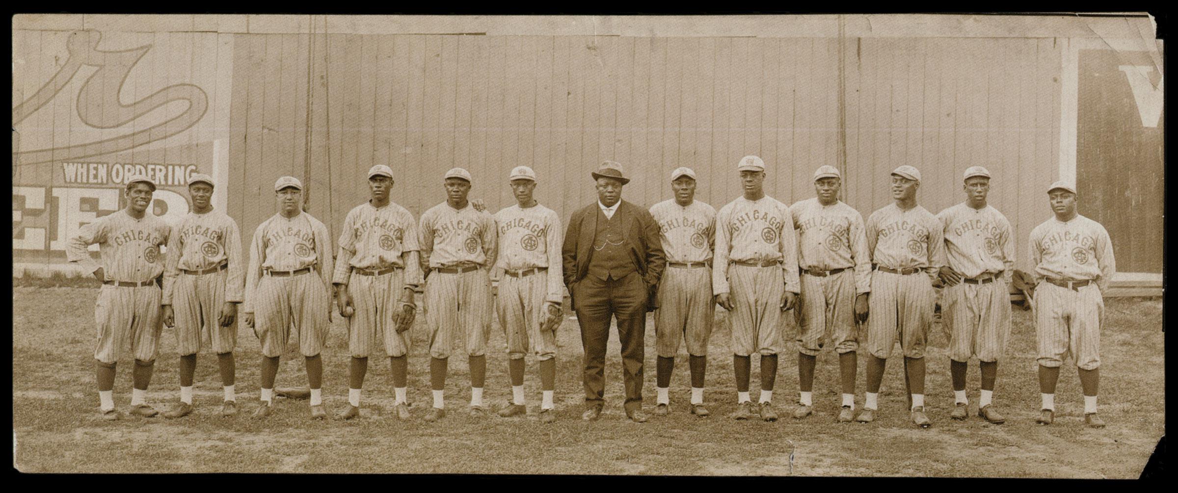 The only known photograph of Edgar Washington’s pitching days with the 1916 Chicago American Giants (left to right): Pete Hill, Harry Bauchman, Steve Dixon, Tom Johnson, Judy Gans, Bruce Petway, Rube Foster, Leroy Grant, Edgar Washington, Unknown #1 (Possibly C. Bernice Wood), John Henry “Pop” Lloyd, Unknown #2 (Possibly Clarkson Brazelton), and Frank Duncan. Note: This panoramic photo was taken by Stuart Thomson in mid-April 1916, inside Athletic Park, Vancouver, British Columbia. It was auctioned in the spring of 2012, by Robert Edward Auctions, and sold for an astounding $38,513.00. Positive player identifications by Gary Ashwill and Mark V. Perkins.