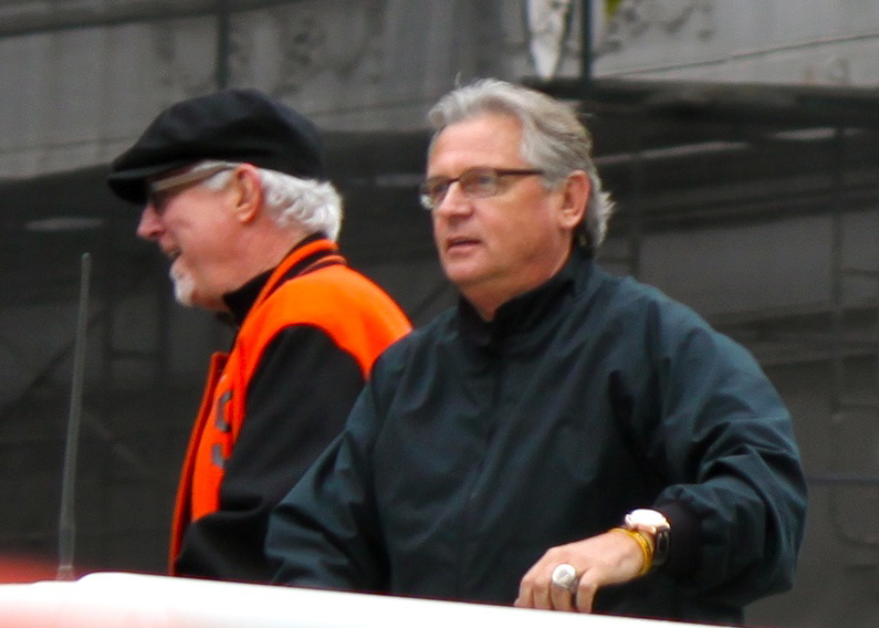 At right, with broadcast partner Mike Krukow, during the San Francisco Giants' 2012 World Series championship parade.