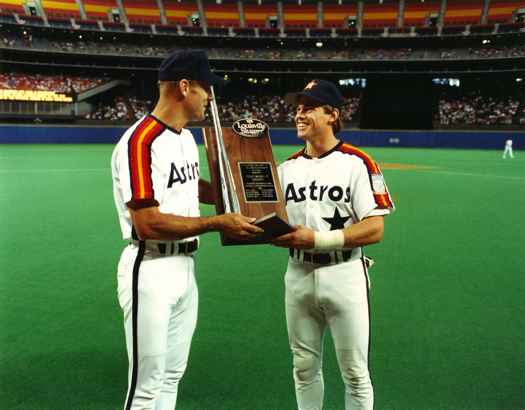 The Astrodome saw its share of stars over the years, including Biggio, who receives his 1989 Silver Slugger Award from manager Art Howe, left.